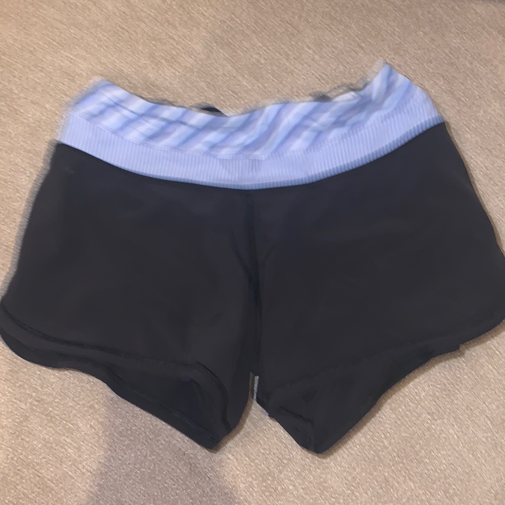 Lululemon old athletic shorts 4” size 4 black with blue patterned waistband